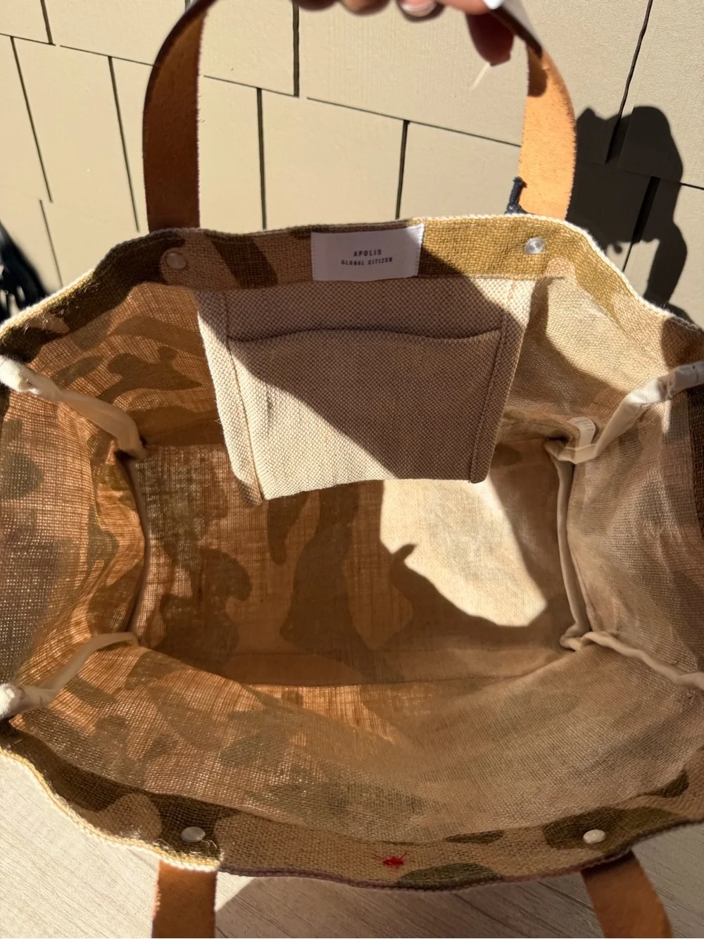 Apolis Global Citizen Market Bag in a safari camo print with tan leather handles